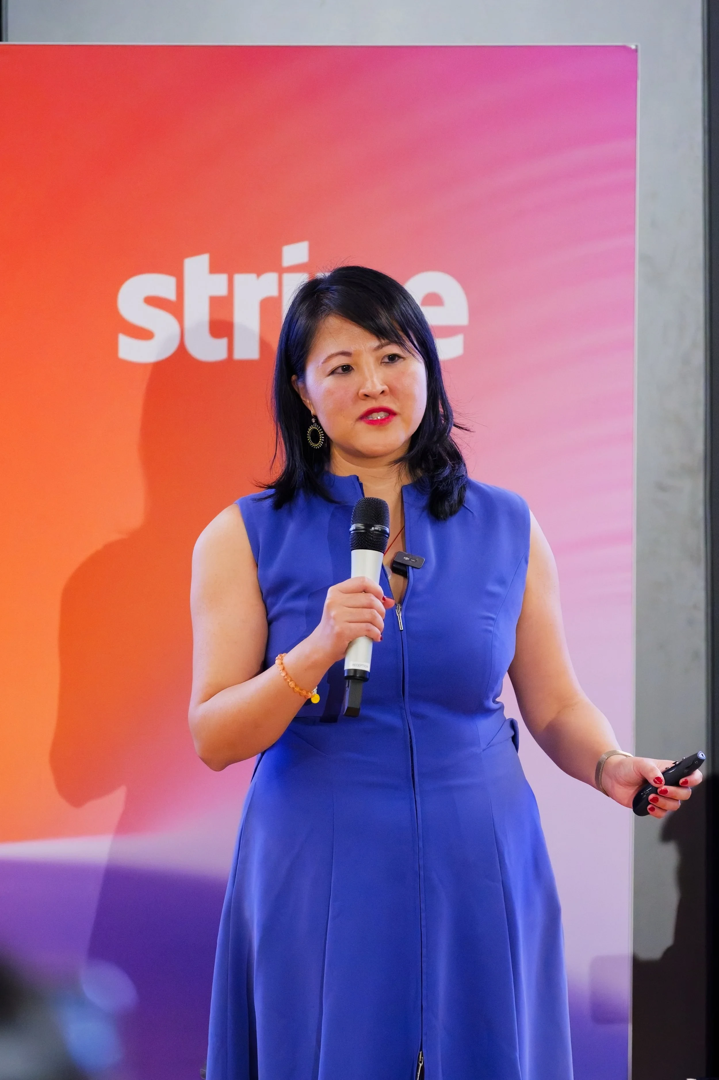 Lucy Lin speaking on stage